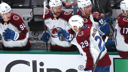 MacKinnon snaps one in tight