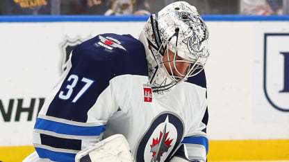 Hellebuyck robs Snuggerud