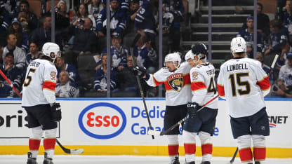 Marchand tacks on empty netter